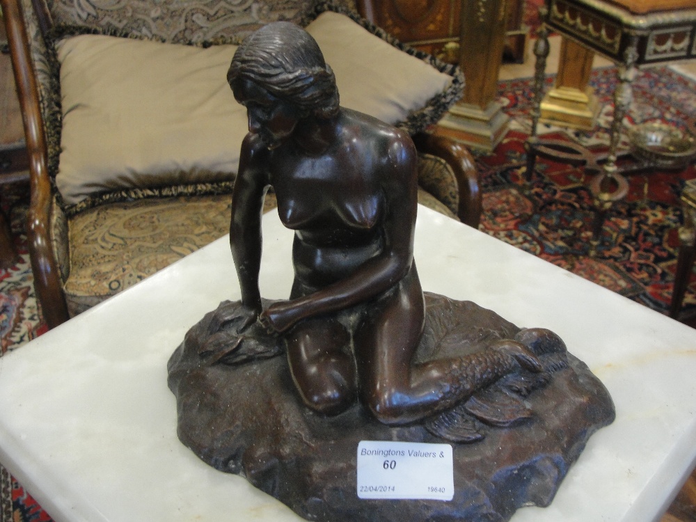 An unsigned bronze of The Little Mermaid in the style of Edvard Eriksen
