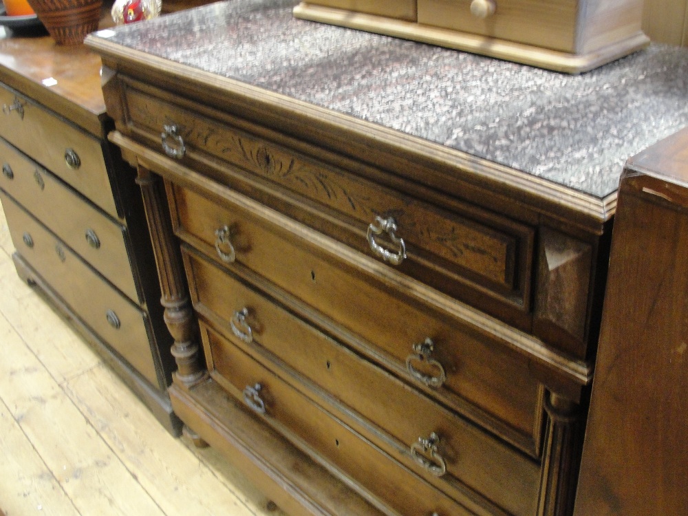 A 19th century French marble-topped chest of drawers