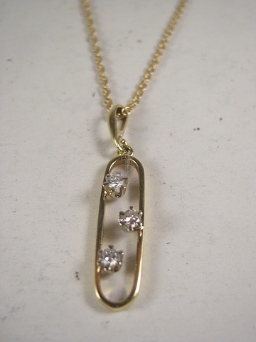 An 18ct gold pendant set with diamonds