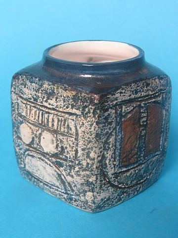 A retro Troika marmalade pot having a blue glazed ground with geometric designs, signed to the base,