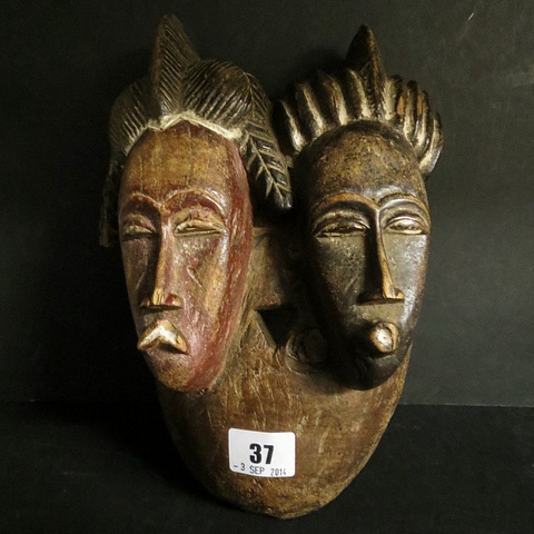 Tribal art African carved wooden twin face mask, Ivory Coast, possibly Baule peoples, with painted