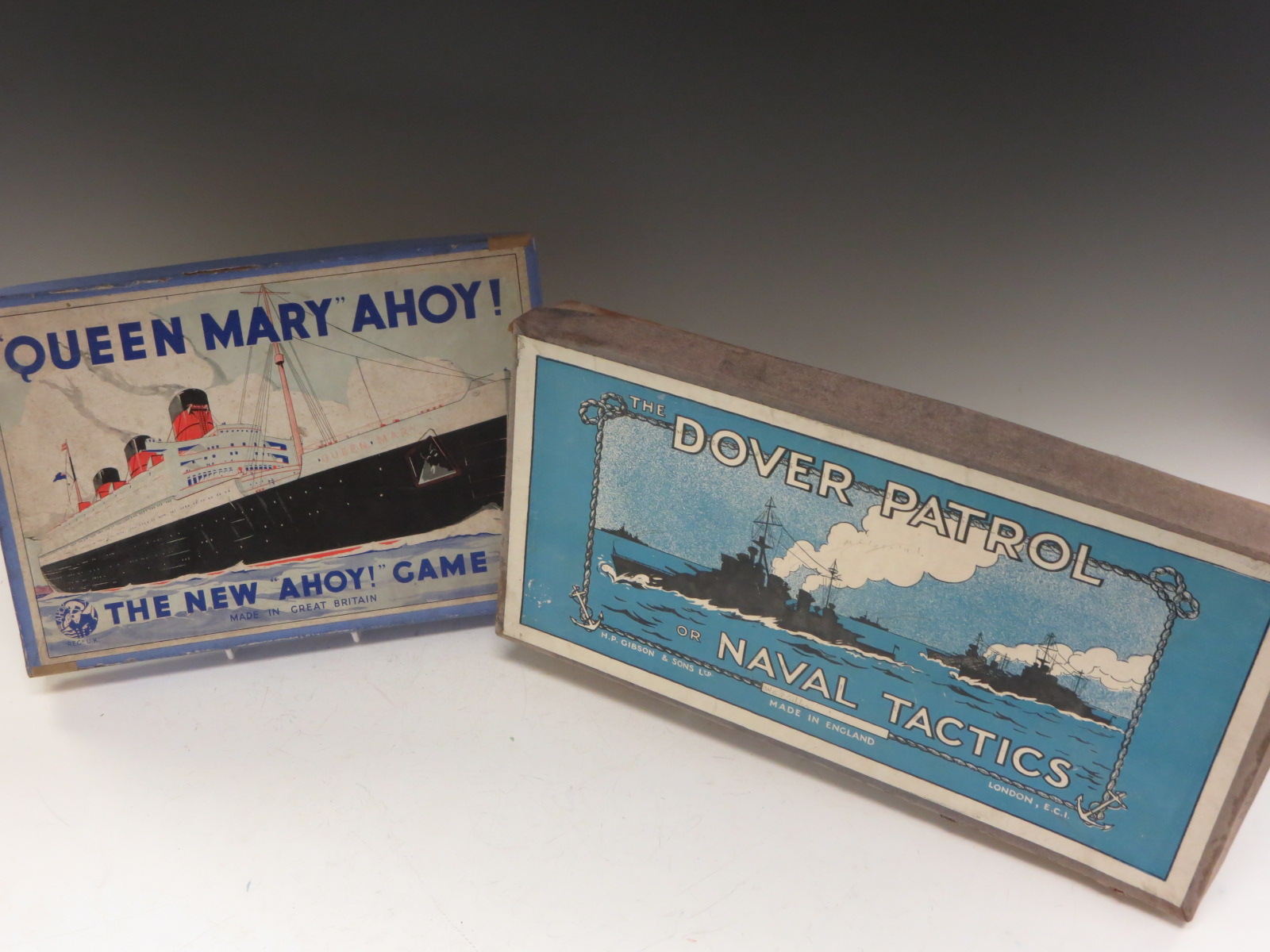 A boxed Gibson and Son ‘The Dover Patrol’ game, ‘Queen Mary Ahoy’, Tri-tactics’ and ‘Aviation’ games