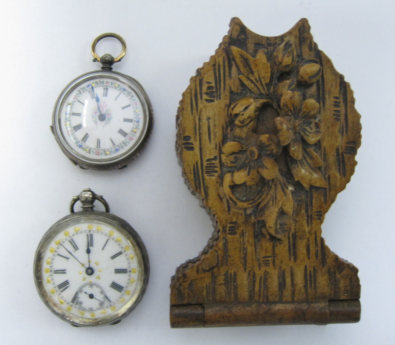Two Lady`s Continental silver Fob Watches with decorated white enamel dials and engraved cases,