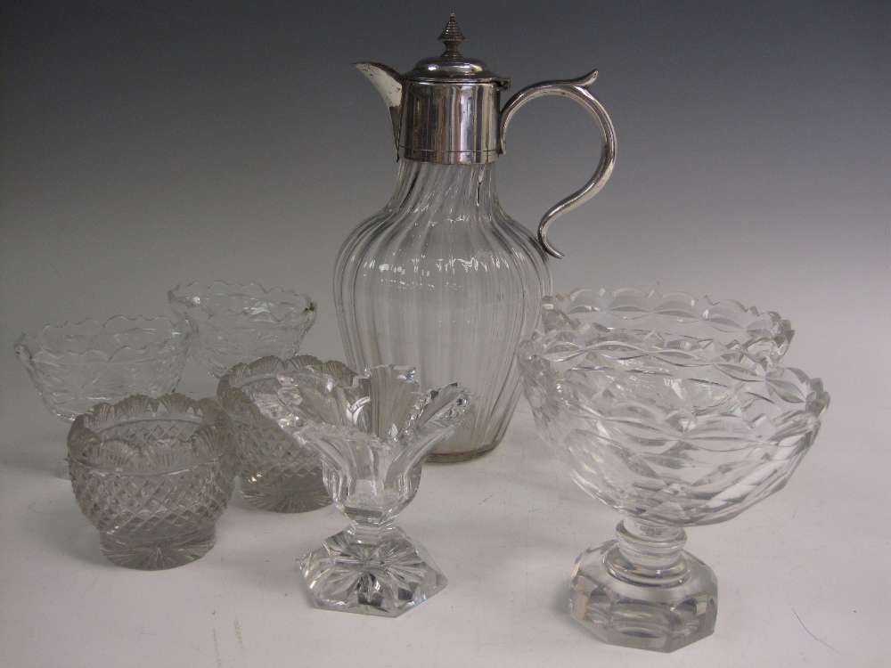 A fluted glass Claret Jug with plated hinged lid, and seven various cut glass Salts of circular