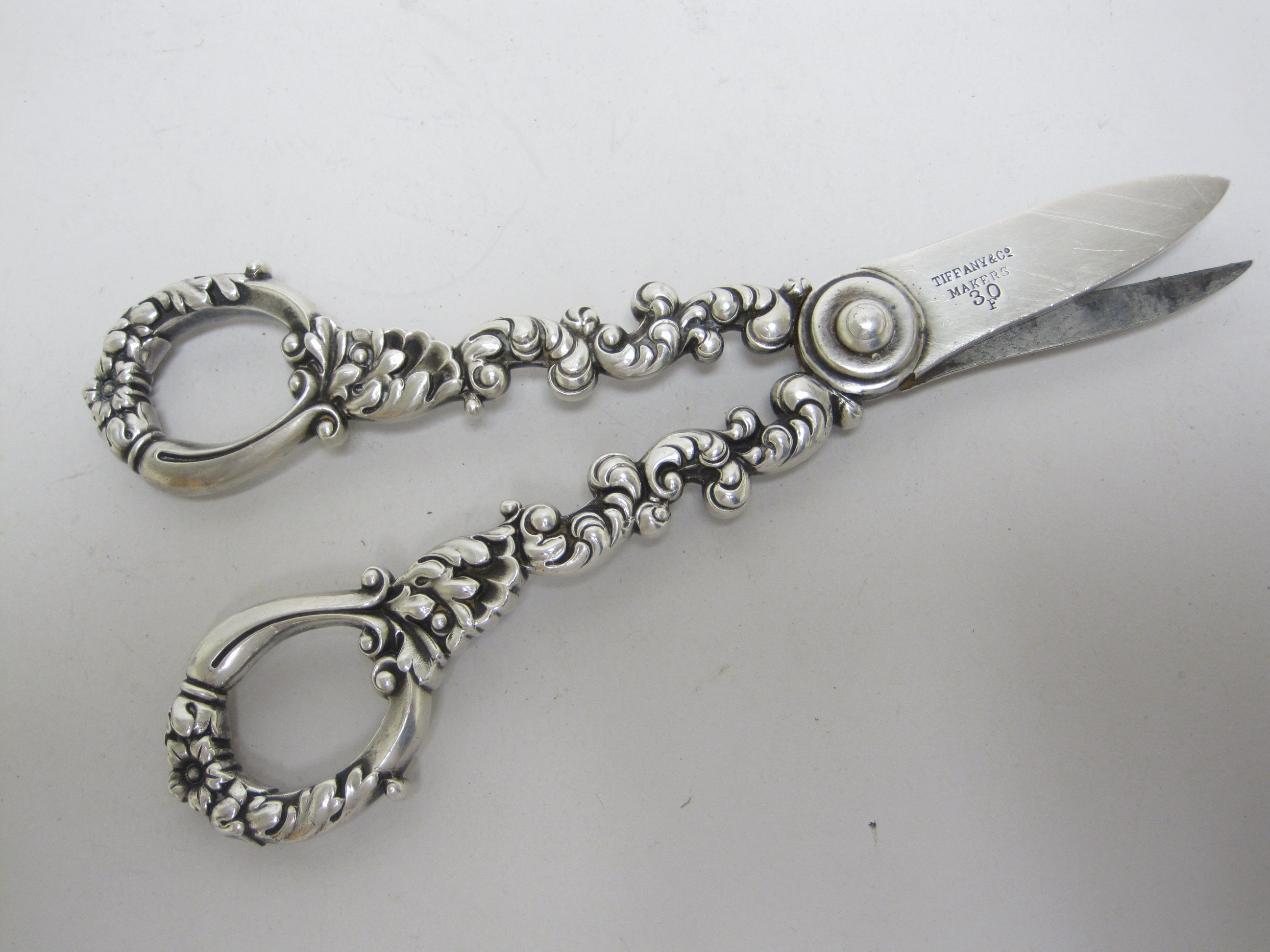 Pair of Tiffany & Co silver Grape Scissors with floral and leafage scroll design, marked: