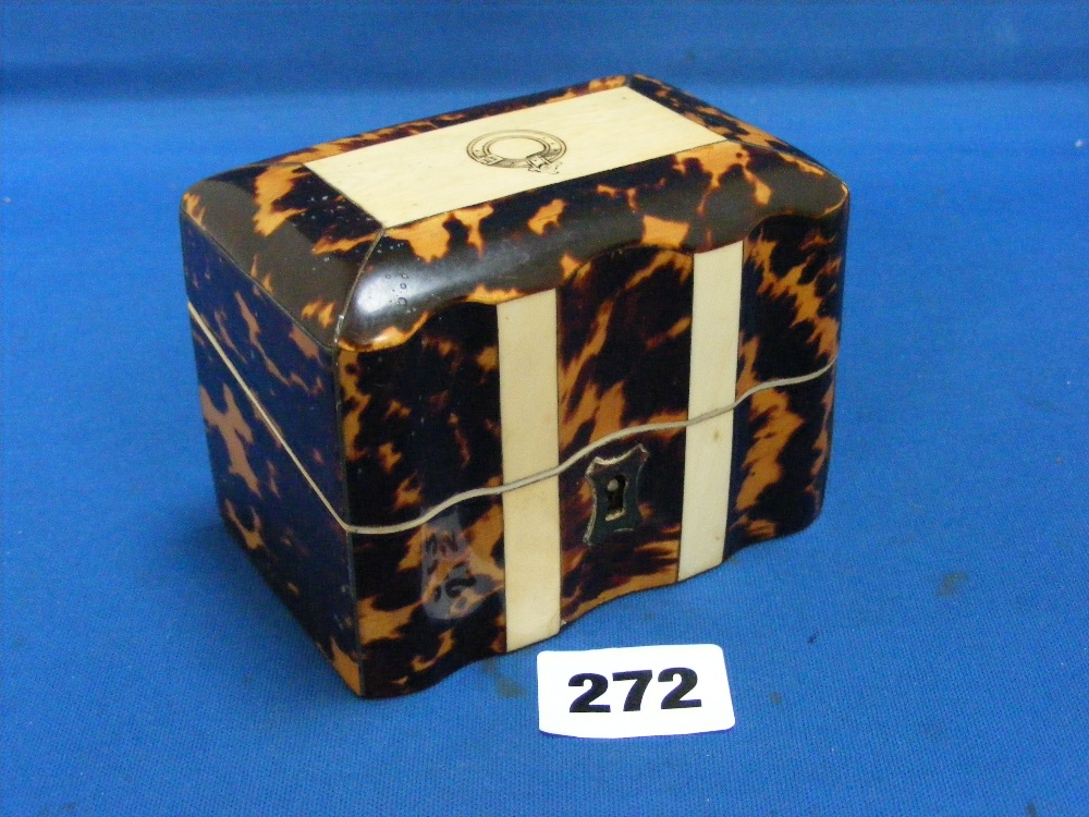 An early Victorian ivory and tortoiseshell box with double serpentine shape to the front with