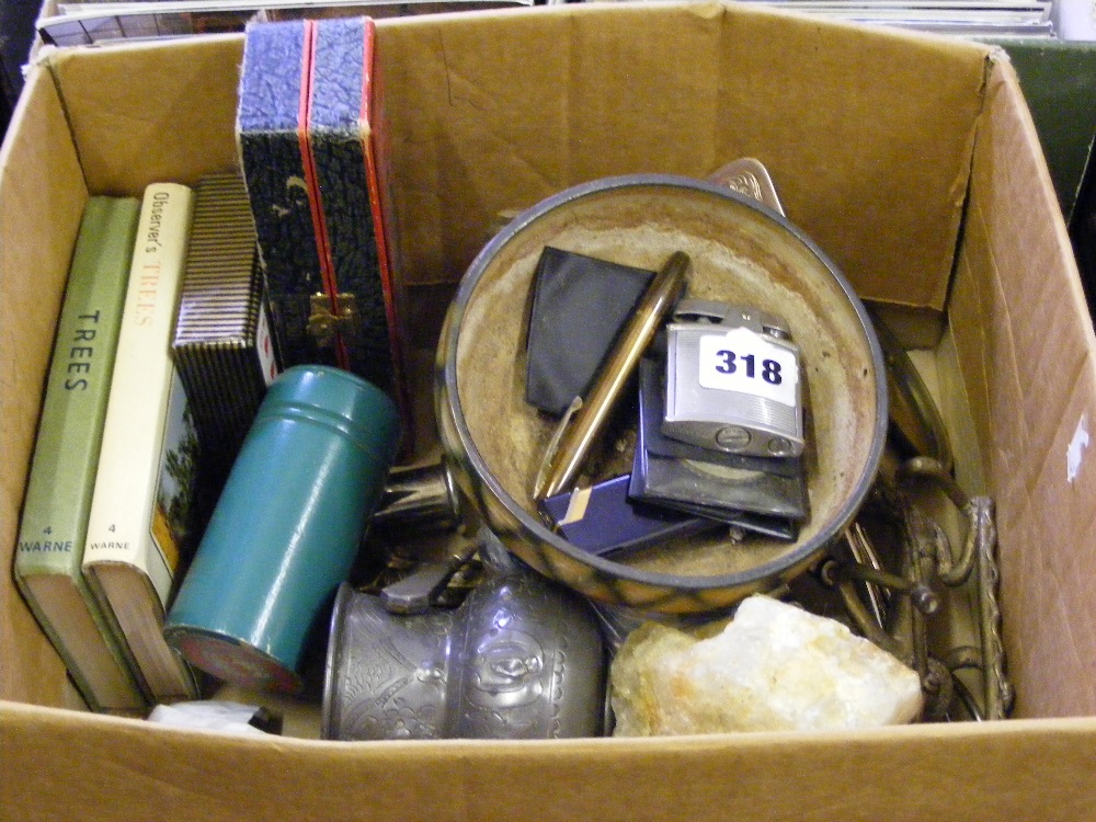 A box of collectable items, to include a harmonica, metal ware, observer books etc.