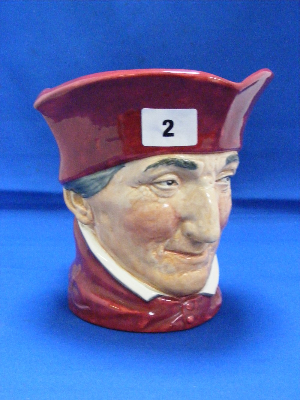 A Royal Doulton Character jug of The Cardinal.