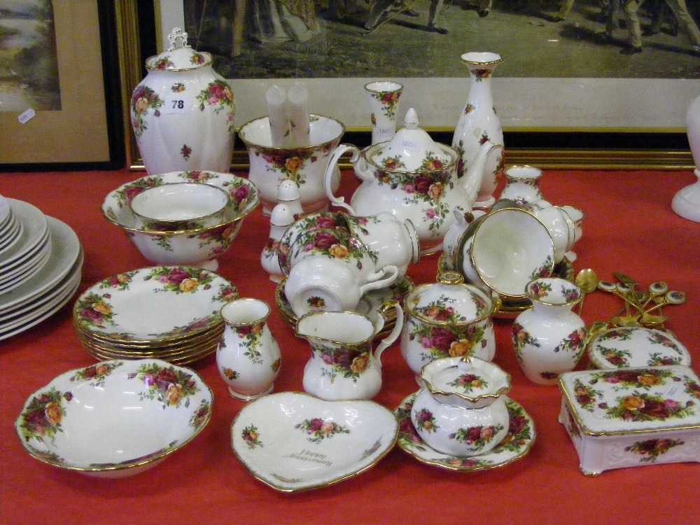 A collection of Royal Albert tableware in the Old Country Roses pattern, to include teapot, cups,