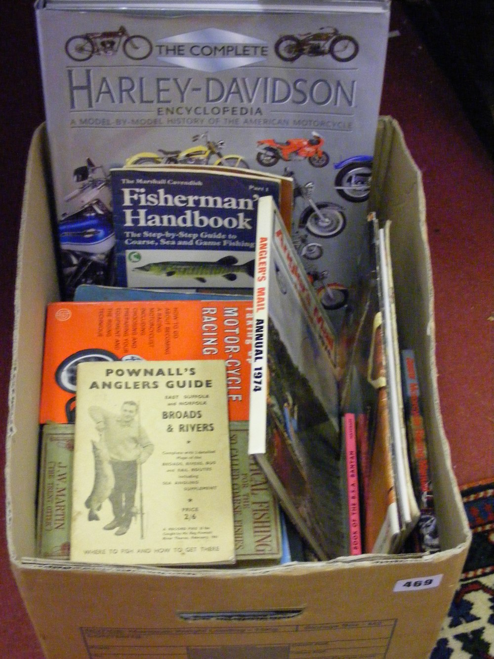 A box of Motorcycle Mechanic vintage magazines, a book of motor cycle interest, plus fishing related