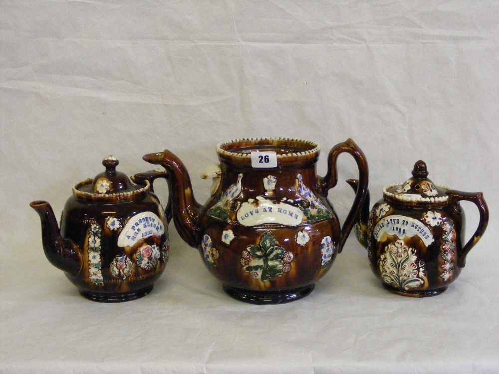 Three Victorian graduated Barge ware teapots (1 missing lid).