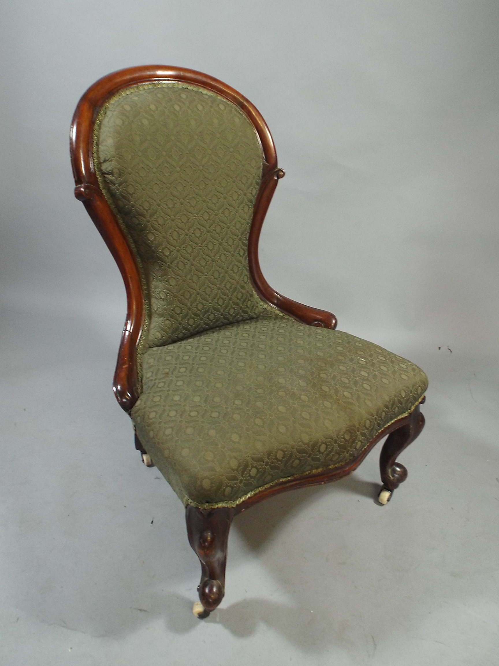 A Late Victorian Mahogany Framed Ladies Nursing Chair with Spoon Back