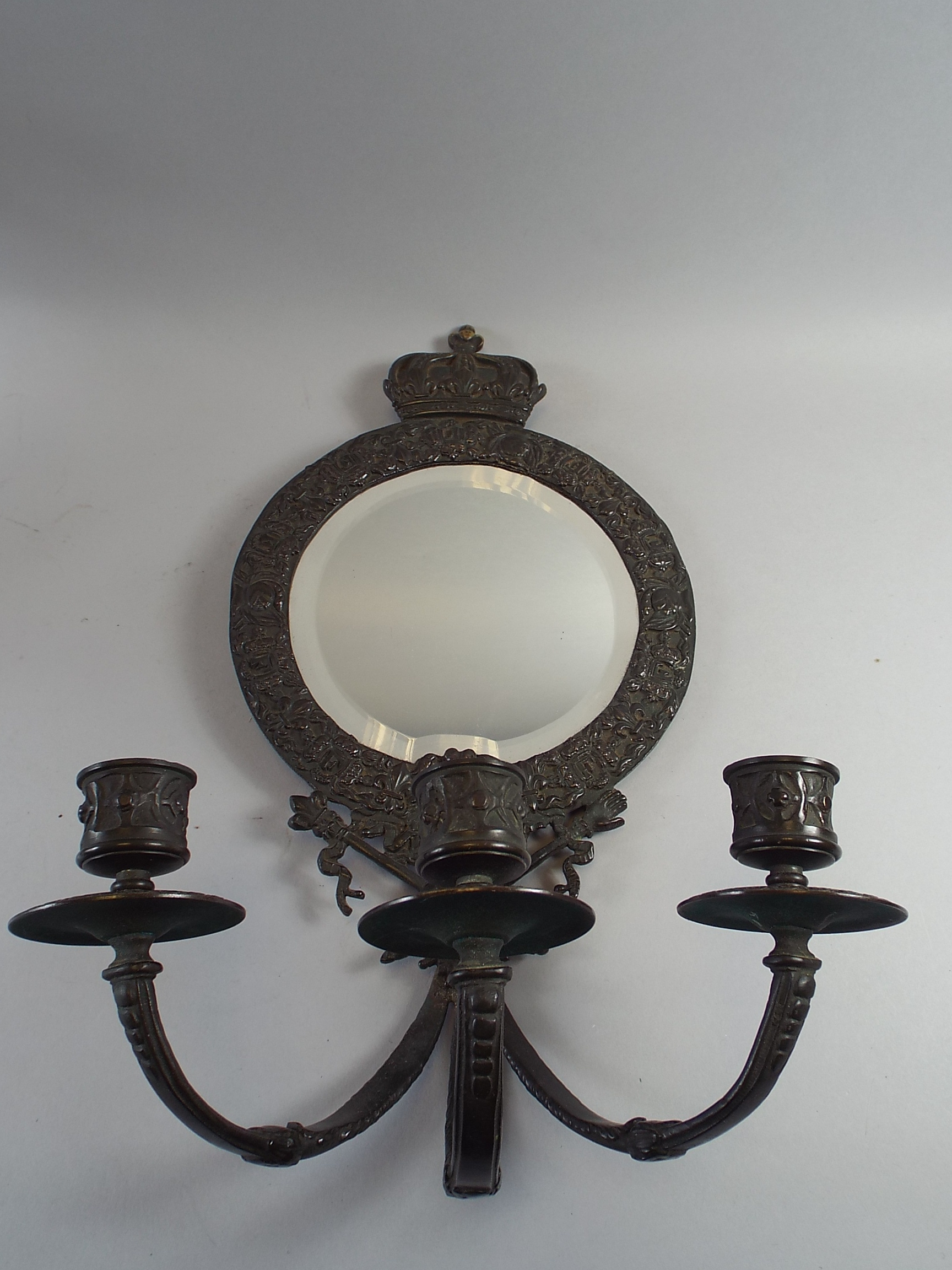 A 19th Century Bronze Girandole Wall Mirror with Three Shaped Arms and Candle Sconces. 38x24cm