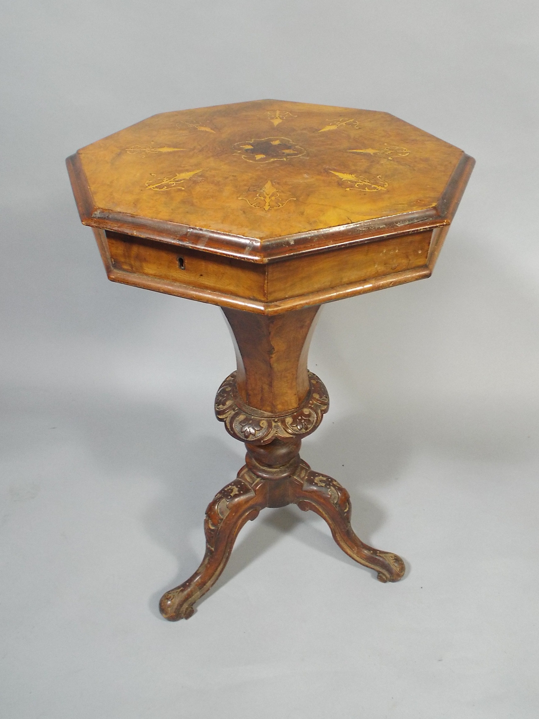 A Victorian Octagonal Ladies Trumpet Work Table. The Inlaid Lid Lifting to Reveal Fitted Interior