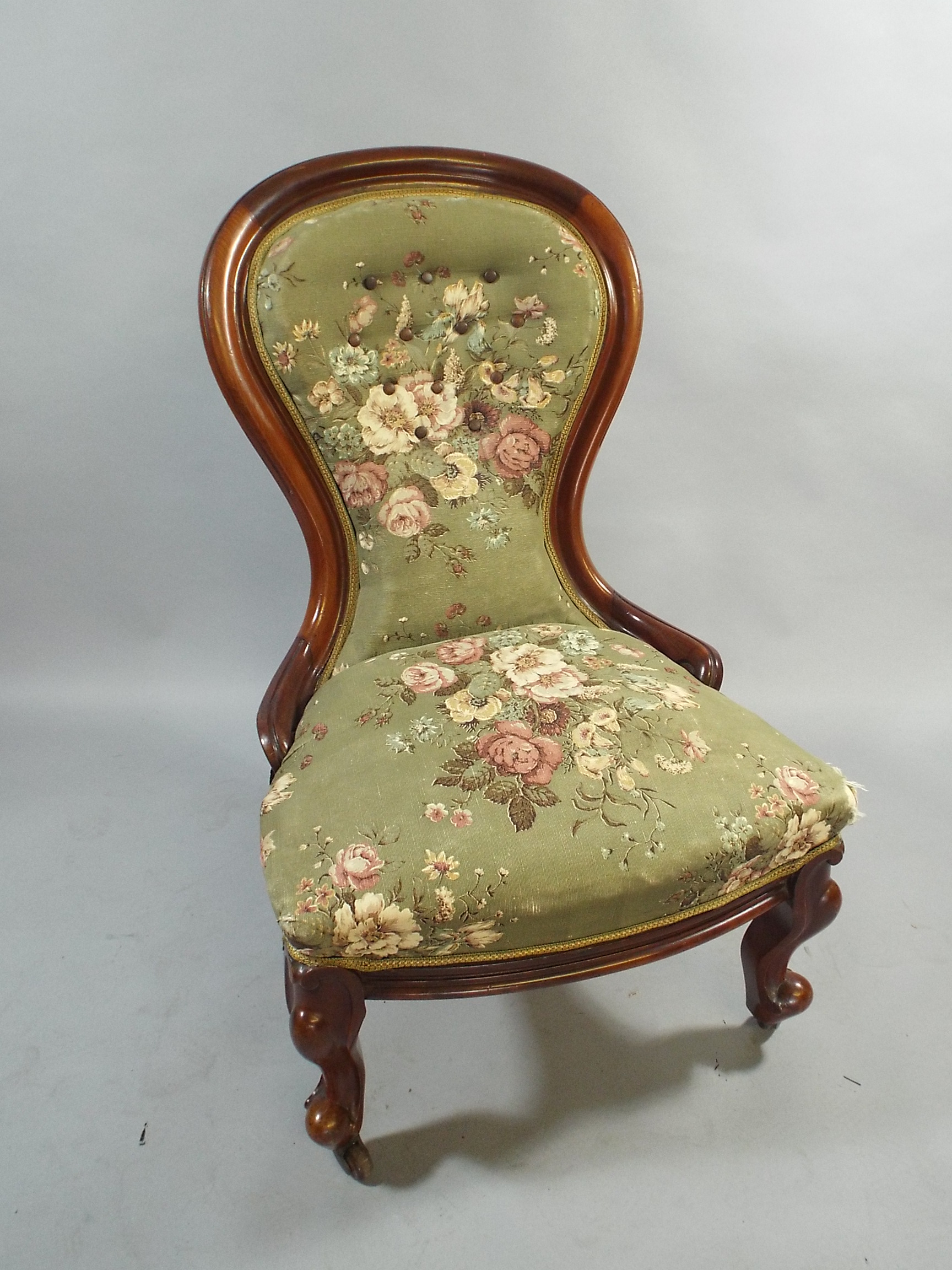 A Victorian Mahogany Framed Spoon Back Ladies Nursing Chair with Carved Cabriole Front Legs