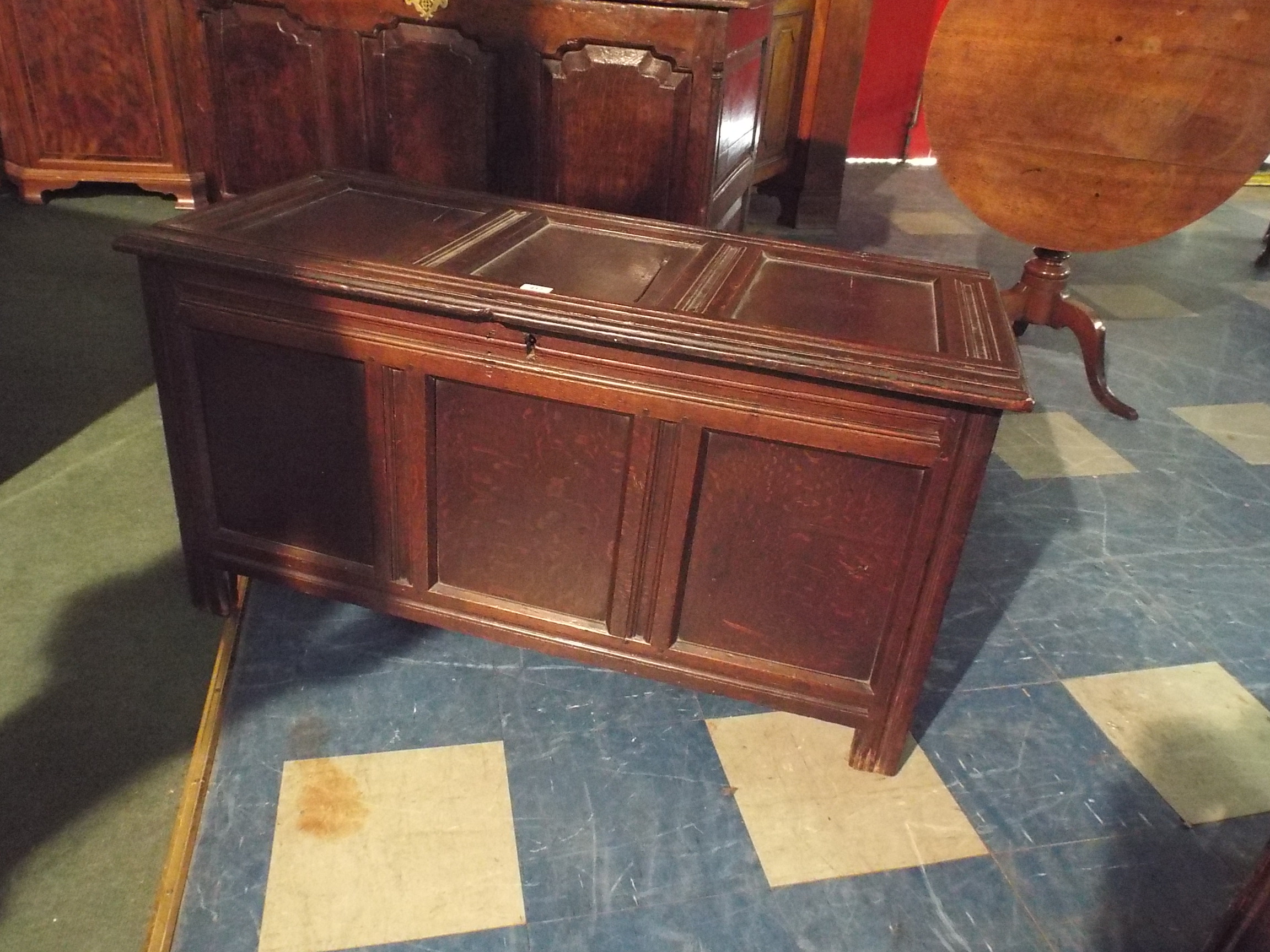 An Oak Three Panel Lift Top Coffer Chest with Inner Candle Box