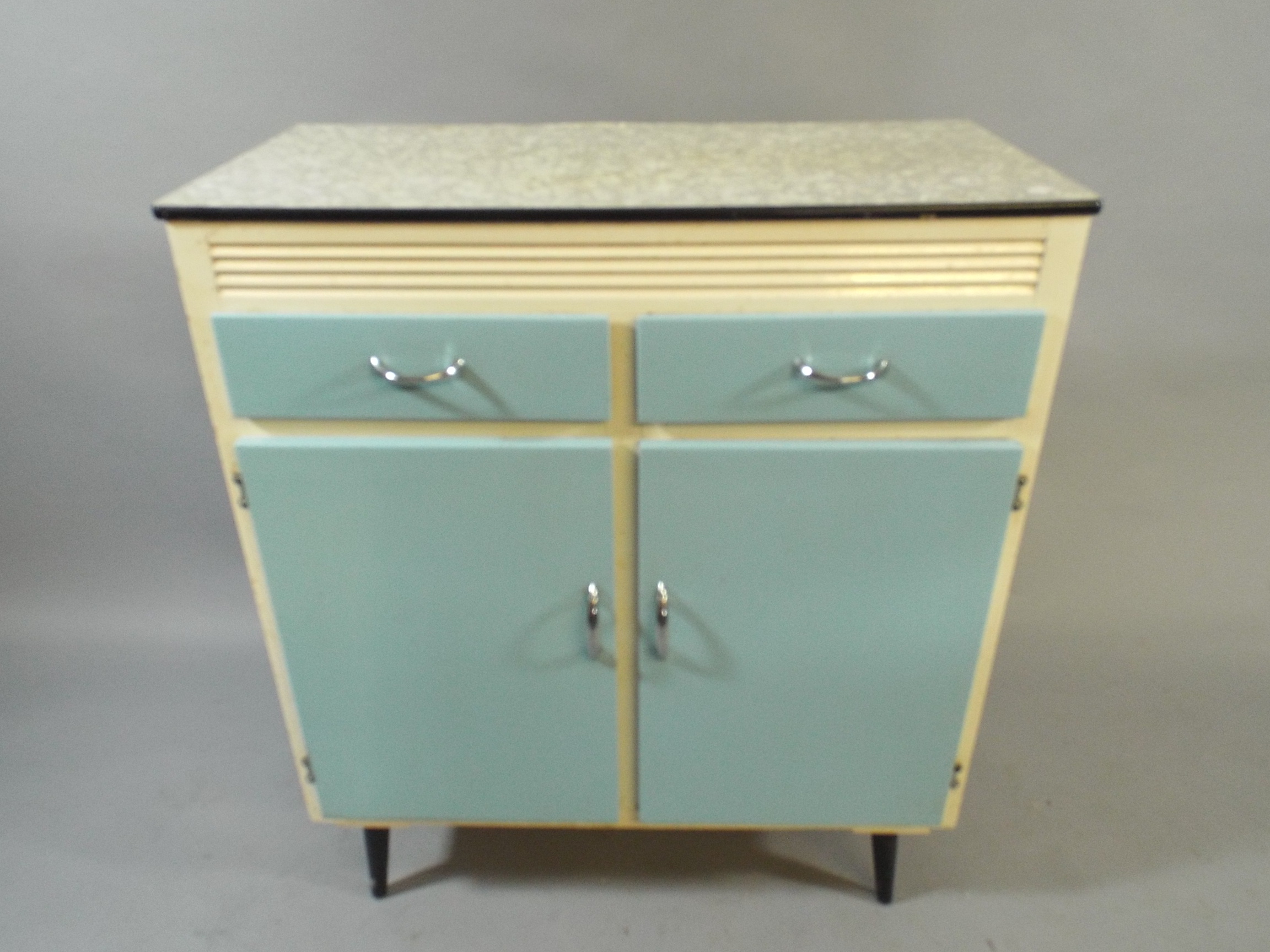 A 20th Century 1950s Two Drawer Kitchen Cabinet on Tapering Supports with Blue Doors and Chrome