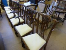 Eight Mahogany Reproduction Chippendale Style Dining Chairs, including two carvers.