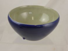 A Chinese Midnight Blue Ceramic Bowl, with olive green glaze interior.