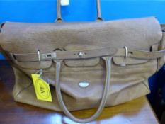 A Leather Tote Duffel Bag by Mac Douglas, retailer Abercrombie & Kent.