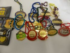 Twenty different Racecourse metal members and sponsors badges from 2000 onwards.