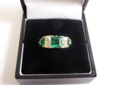 A Lady`s 18 ct Yellow Gold Emerald and Diamond Ring, the fine quality emerald set in an attractive