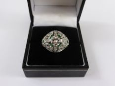 A Lady`s Art Deco Style Platinum Diamond and Emerald Filigree Ring, centre stone 1 ct 6.5 x 3.5 mm,