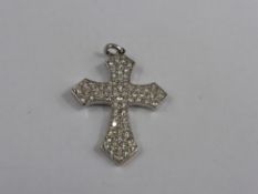 An 18 ct White Gold and Diamond Cross, the cross set with approx 1 ct of dia, 4.5 gms.