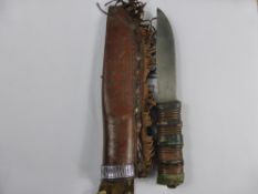 A vintage Bowie style trading sheath knife,  the steel blade by William Rodgers, Sheffield, the