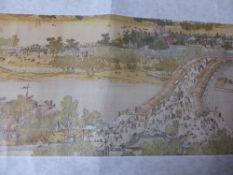 An early 20th century Chinese Parchment Scroll printed with black characters, polychrome landscape