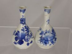 Two Chinese Antique Miniature Blue and White Vases depicting peonies approx 14 cm in height with