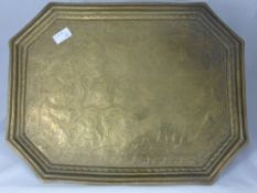 A 19th Century Indian Ornate Brass Serving Tray, engraved with Hindu deity and decorative floral