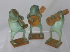 Victorian Taxidermy Toad Jazz Trio, the toads depicted standing with hand carved musical