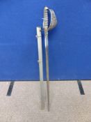 A Henry Wilkinson Pall Mall George V Officers Dress Sword in chrome scabbard.