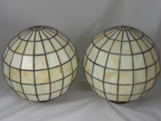 A Pair of Cream Globe Shaped Balustrade Lamps, retailer Christopher Wray, London.