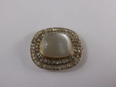 A 14 ct Gold and Silver Moonstone and Diamond Collar Brooch, the moonstone 17.5 x 14.4 mm, 73 x old