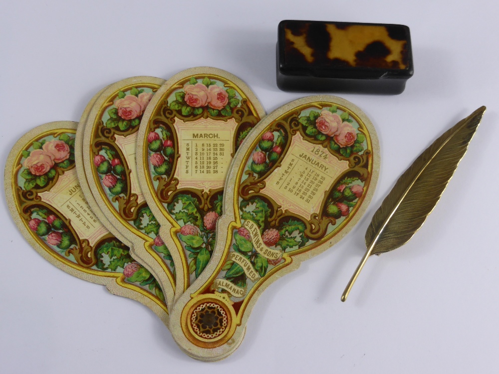 A Tortoiseshell Snuff Box, together with a Victorian date fan for the year 1874 and a gilded brooch
