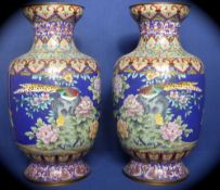 Pair of 20th Century Cloisonne Vases, the brightly coloured vases depicting exotic birds including