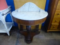 A Victorian mahogany duchess washstand with marble top on scroll feet, est. 91 x 46 x 91 cms.