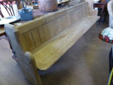 A vintage pine pew, est. 220 x 46 x 85 cms.