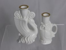 Two Royal Doulton candle holders, one in the form of an owl, the other a swan.