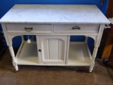 An Edwardian white painted washstand with a marble top, est. 107 x 53 x 78 cms.