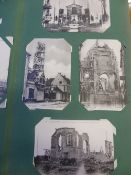 An album of vintage black and white French postcards depicting damage to cathedrals, churches etc.