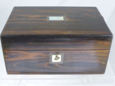 An antique coromandel jewellery box, est. 25 x 17 x 12 cms.