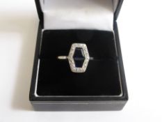 A Lady`s Art Deco 18 ct Yellow Gold and Platinum Diamond and Sapphire Ring, the flat table ring set