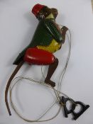 A German Lehmann Tin Climbing Tom Monkey nr 385, flock sprayed coat with yellow waistcoat and a red