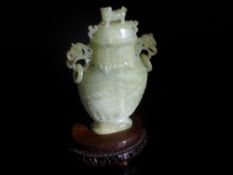 Chinese 20th Century Pale Celadon Jade Vase and Cover. The vase carved with Taotie in shallow