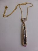 A Pink Kunzite and Diamond Drop Pendant on an 18 ct gold chain, the teardrop pendant formed in two