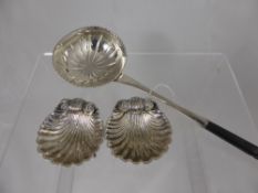 A Pair of Silver Plate Salts, taking the form of scallops with three dolphin feet together with a