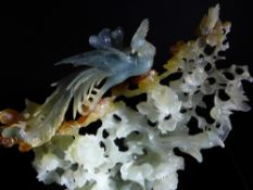 Chinese 20th Century Celadon, Amber and Blue Jade Carving of a Phoenix, the splendid carving in